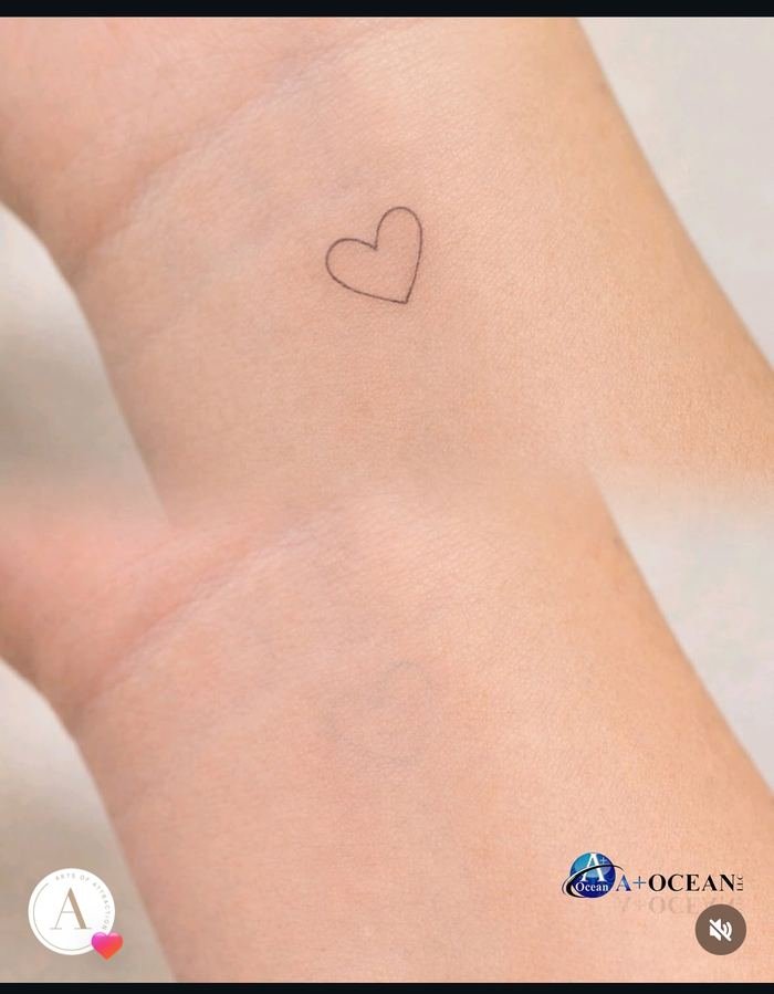 Small heart tattoo almost fully faded after saline removal
